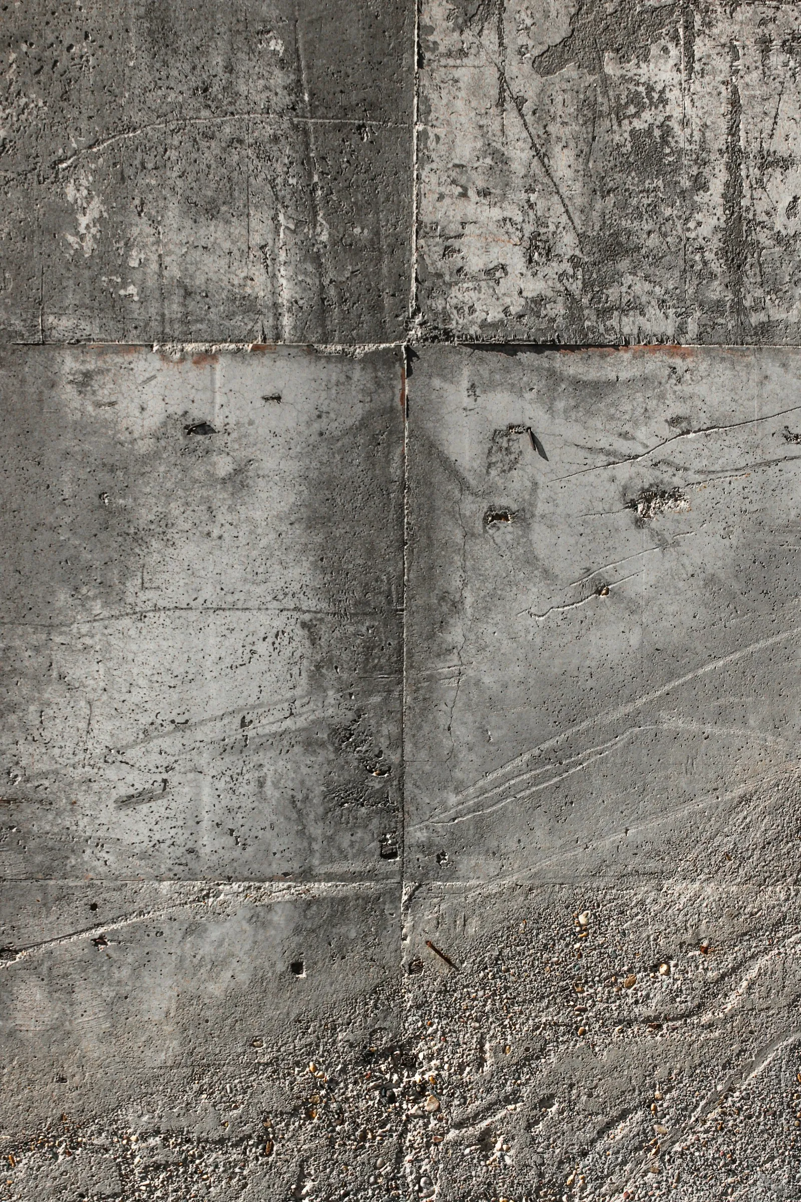 Concrete wall with visible thickness — the class of construction that blocks conversation entirely